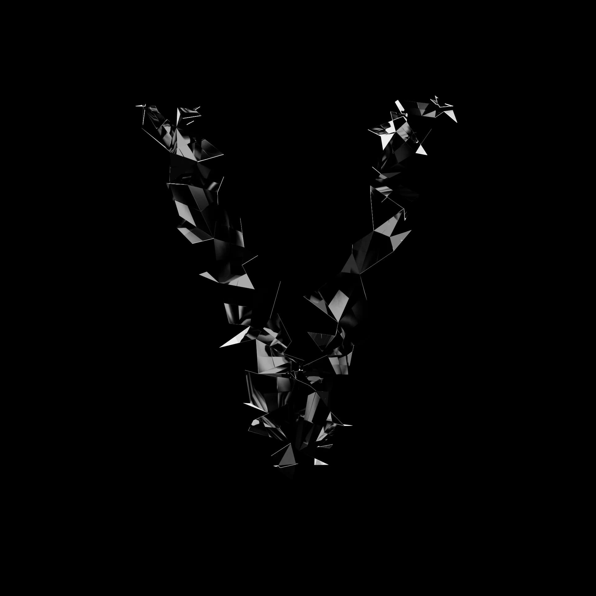 Letter V from Shard Type: a 3D character shattered into angular shards of black specular material on a white background